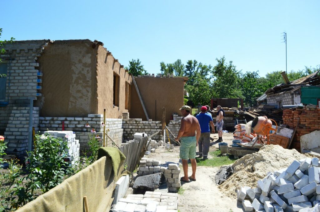 Church team rebuilding bombed house